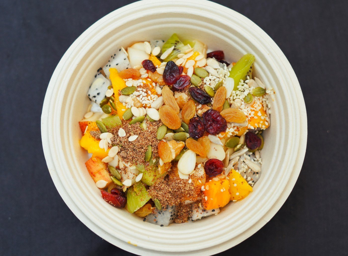 Sun Bowl — chia soaked in yogurt with six fresh fruits, nuts and seeds